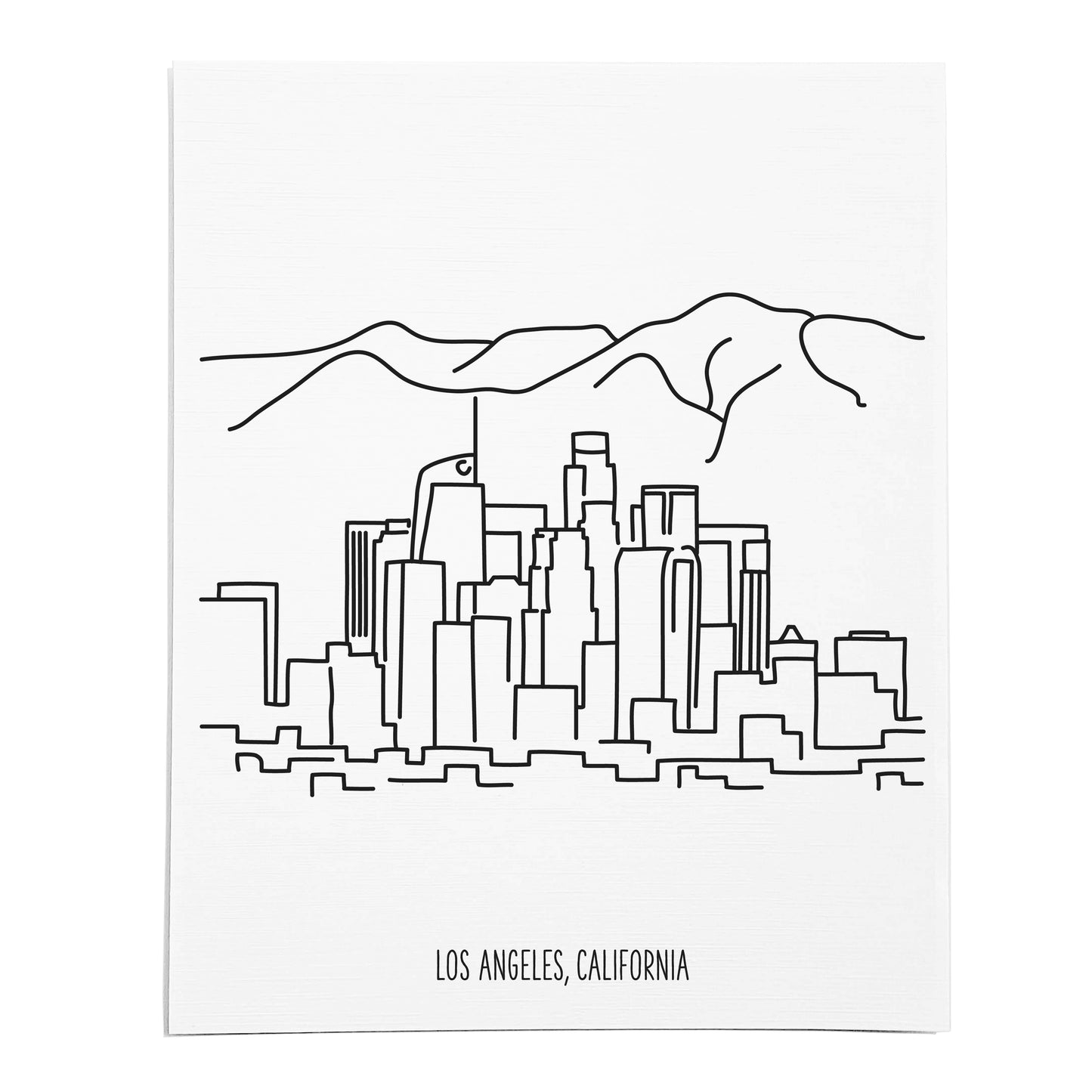 An art print featuring a line drawing of the Los Angeles Skyline on white linen paper