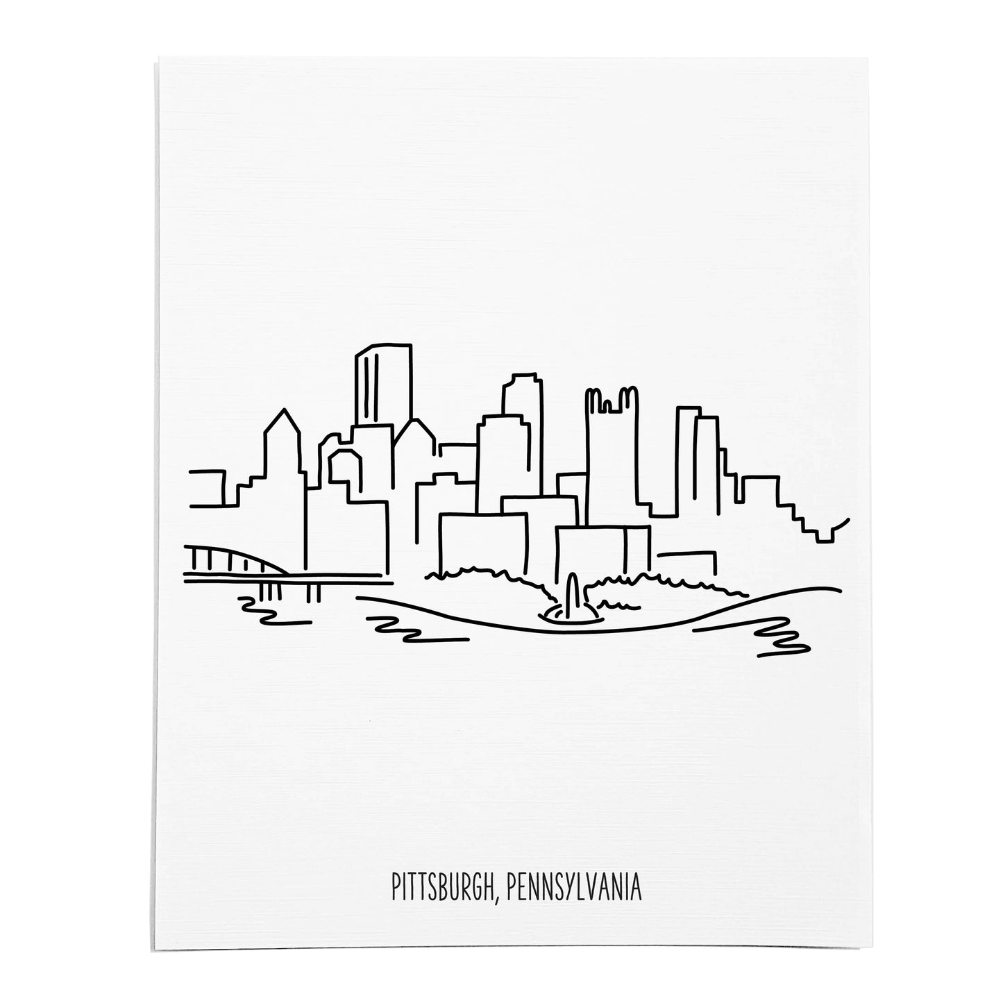 An art print featuring a line drawing of the Pittsburgh Skyline on white linen paper
