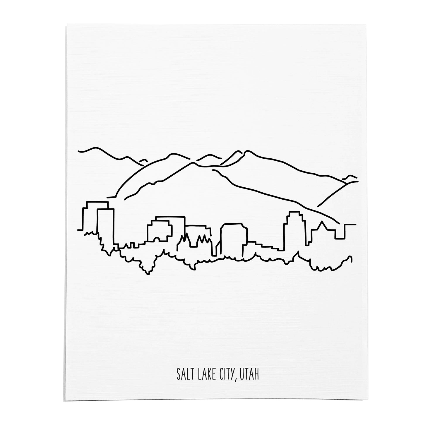 An art print featuring a line drawing of the Salt Lake City Skyline on white linen paper