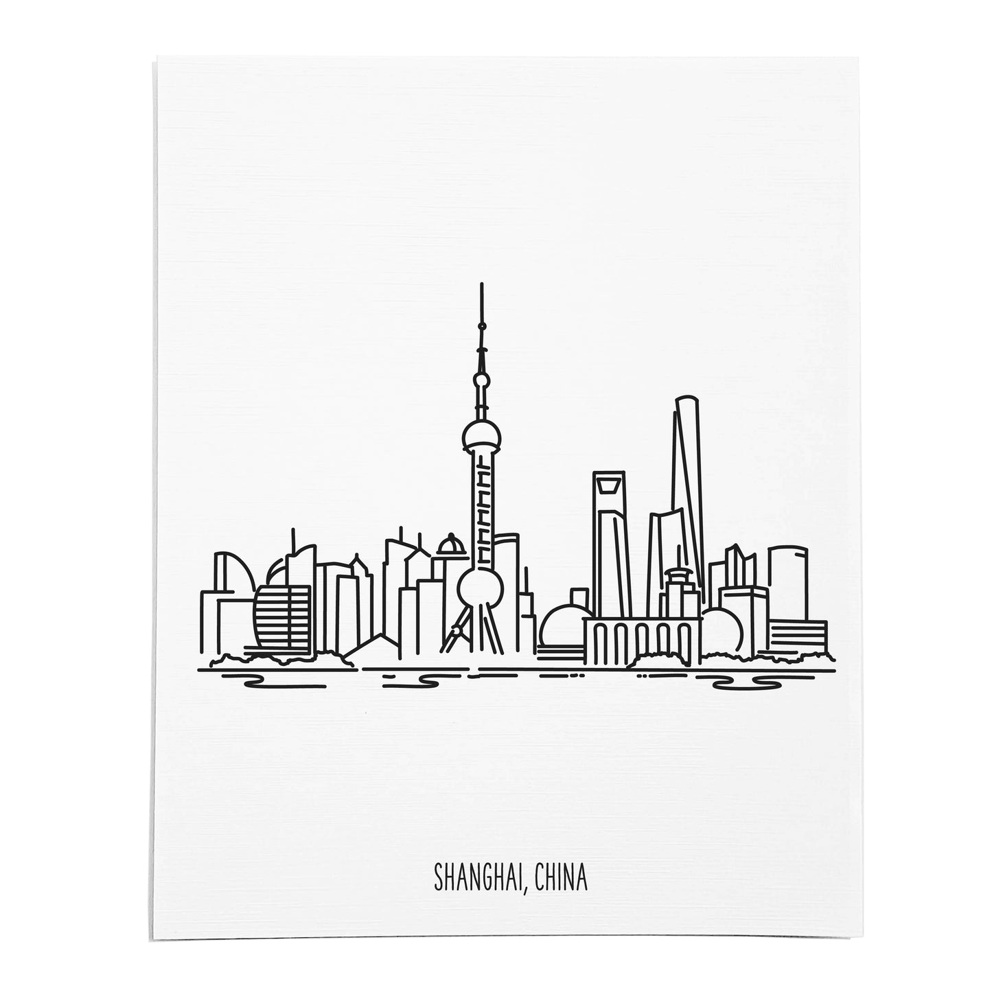 An art print featuring a line drawing of the Shanghai Skyline on white linen paper