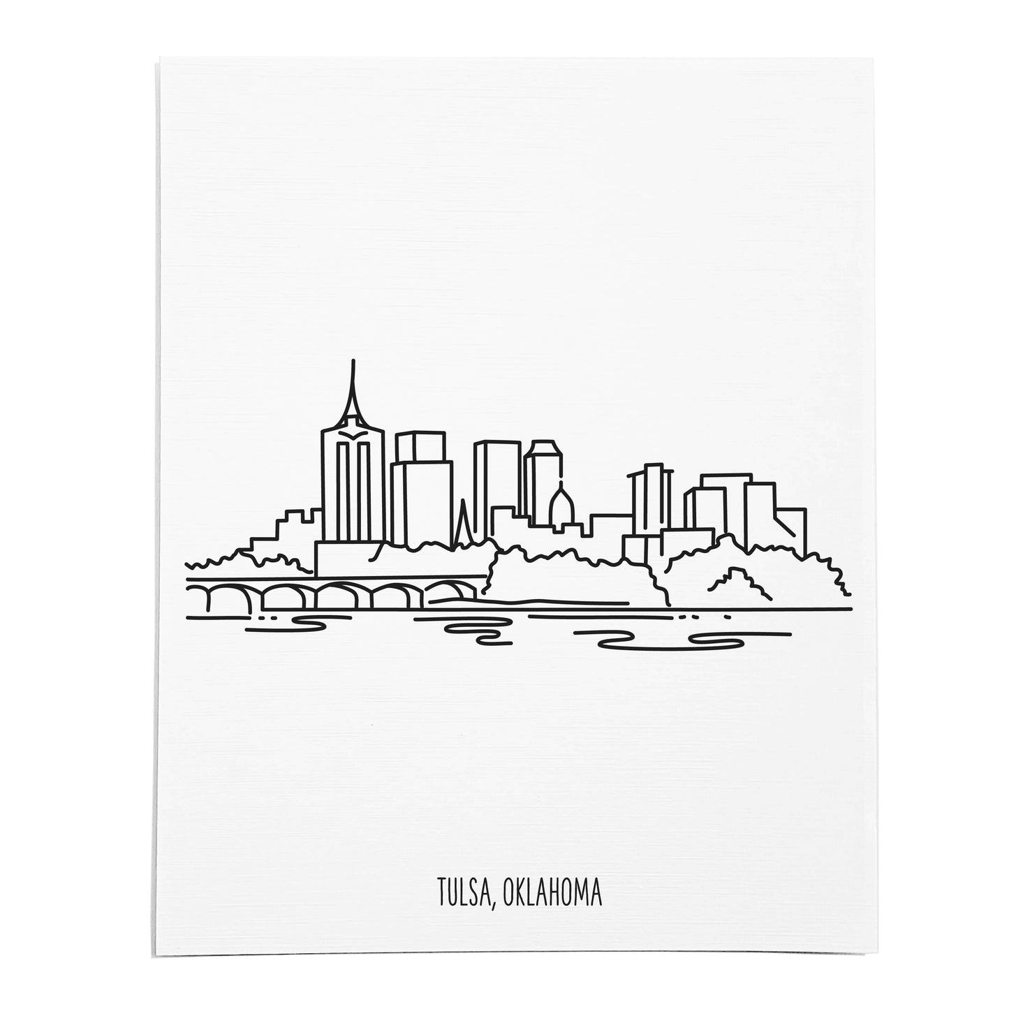 An art print featuring a line drawing of the Tulsa Skyline on white linen paper
