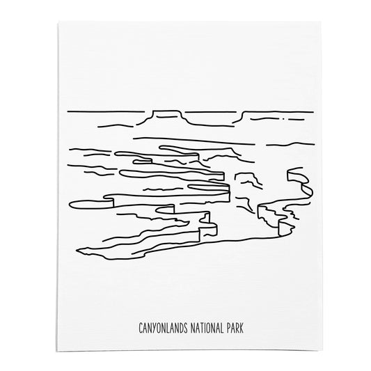 An art print featuring a line drawing of Canyonlands National Park on white linen paper