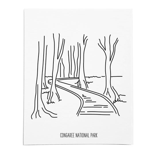 An art print featuring a line drawing of Congaree National Park on white linen paper