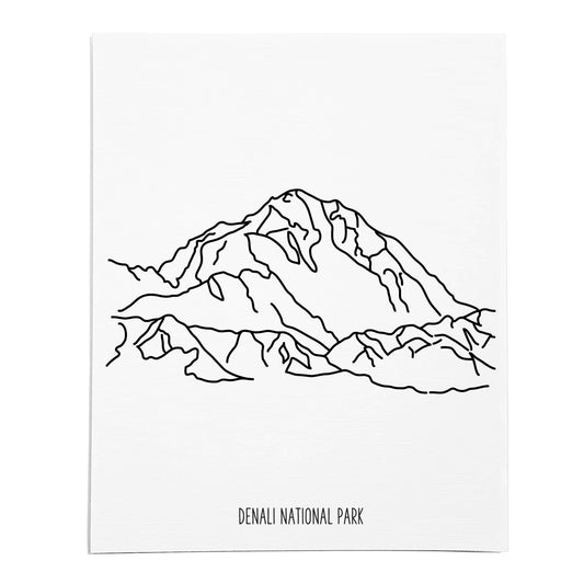 An art print featuring a line drawing of Denali National Park on white linen paper