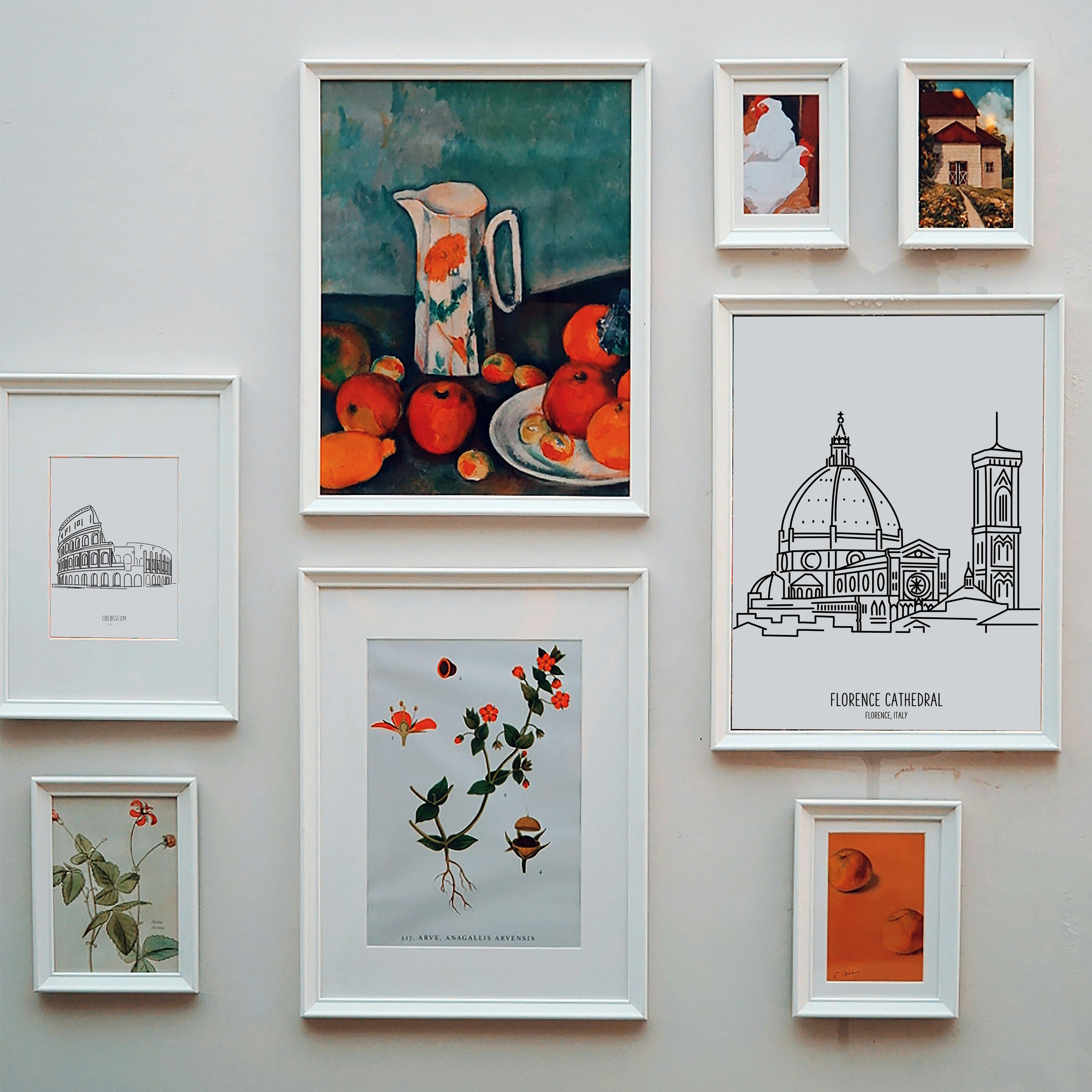 A photo of a gallery wall of framed artwork