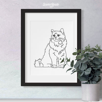 A framed line art drawing of a Birman cat with a plant