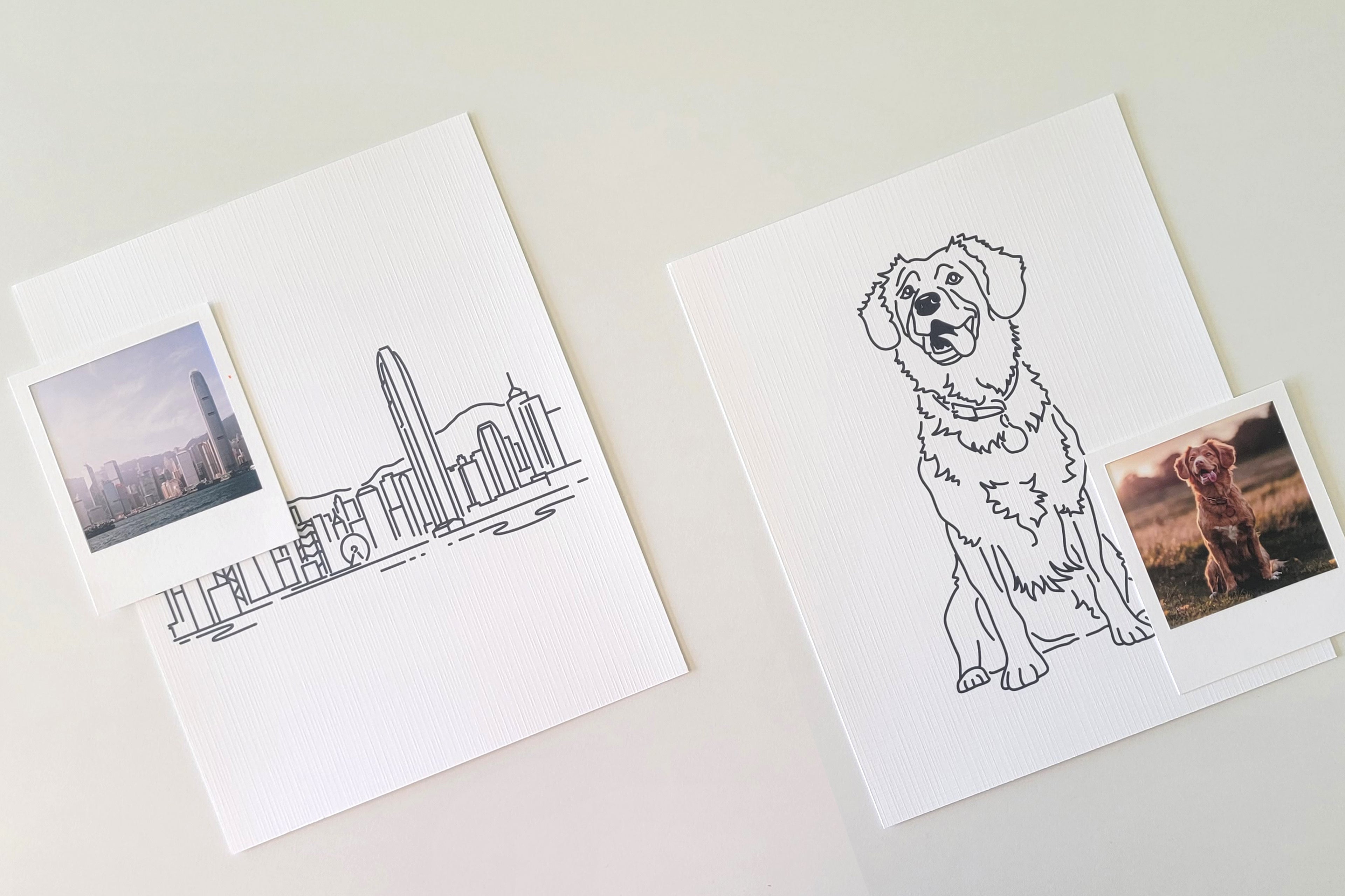 Custom line drawing prints of a skyline and a dog