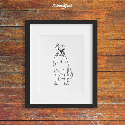 A framed line art drawing of a Cane Corso dog on a wood wall