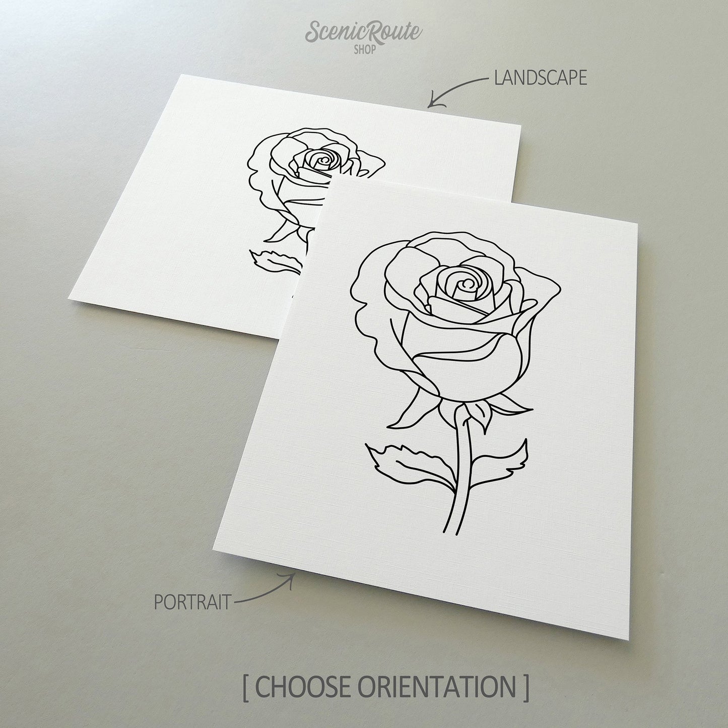 Two line art drawings of a Rose Flower on white linen paper with a gray background.  The pieces are shown in portrait and landscape orientation for the available art print options.