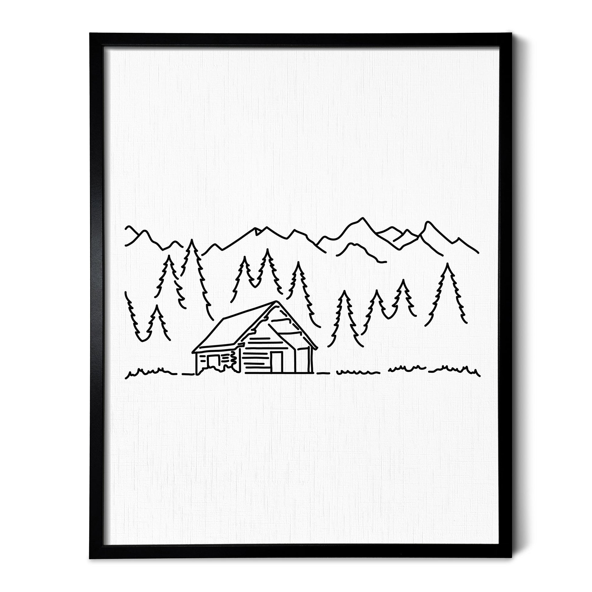 A line art drawing of a Log Cabin on white linen paper in a thin black picture frame