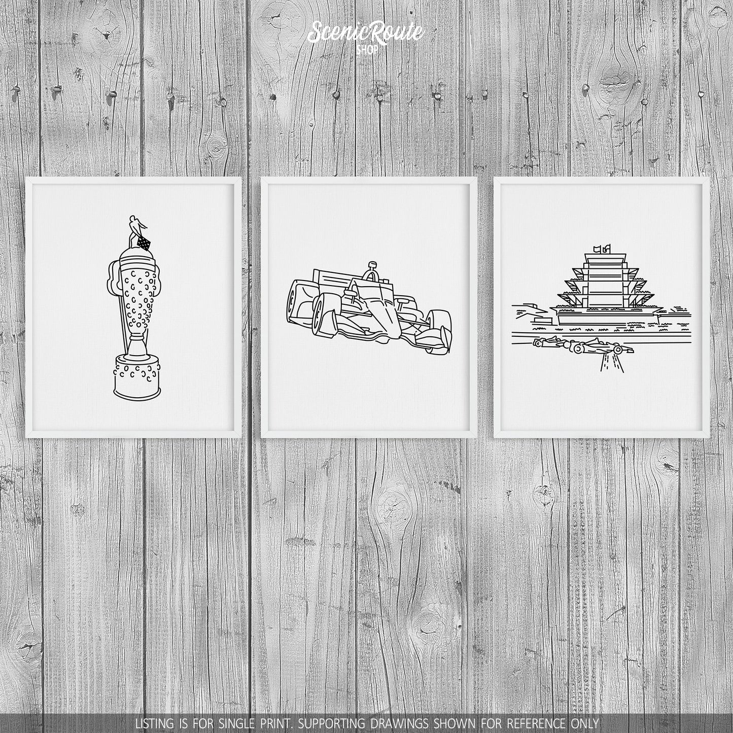 A group of three framed drawings on a wood wall. The line art drawings include the Indy Car Borg Warner Trophy, an Indy Car, and the Speedway Pagoda