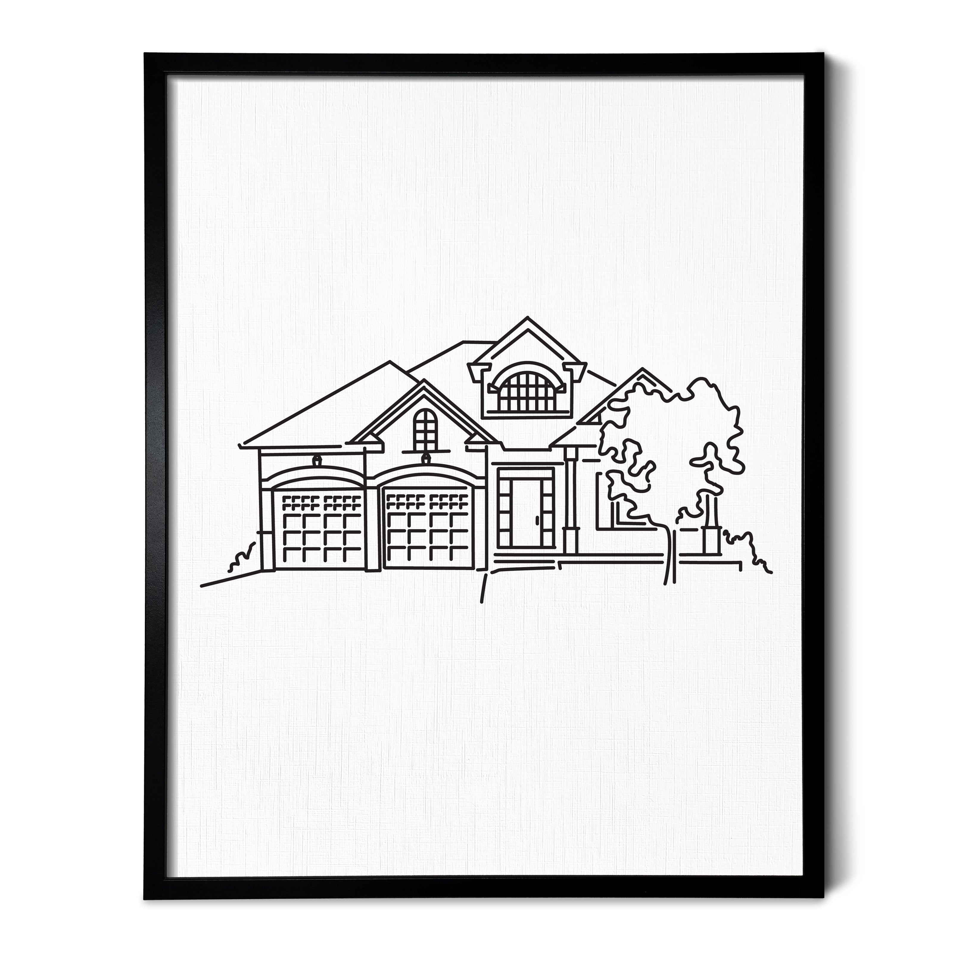 A line art drawing of a house on white linen paper in a thin black picture frame