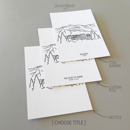 Three line art drawings of Breckenridge in Colorado on white linen paper with a gray background.  The pieces are shown with title options that can be chosen and personalized.