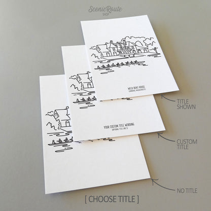 Three line art drawings of the Boston Harvard Weld Boathouse on white linen paper with a gray background.  The pieces are shown with title options that can be chosen and personalized.