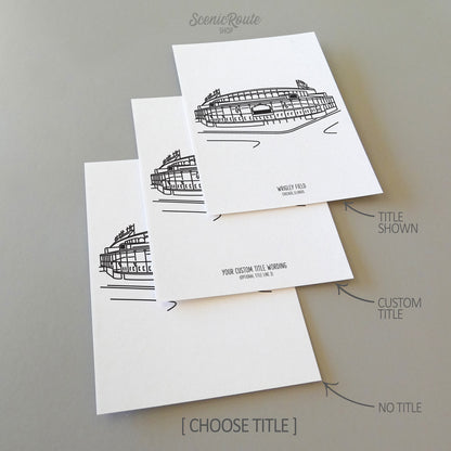 Three line art drawings of the Chicago Cubs Wrigley Field Ballpark on white linen paper with a gray background.  The pieces are shown with title options that can be chosen and personalized.