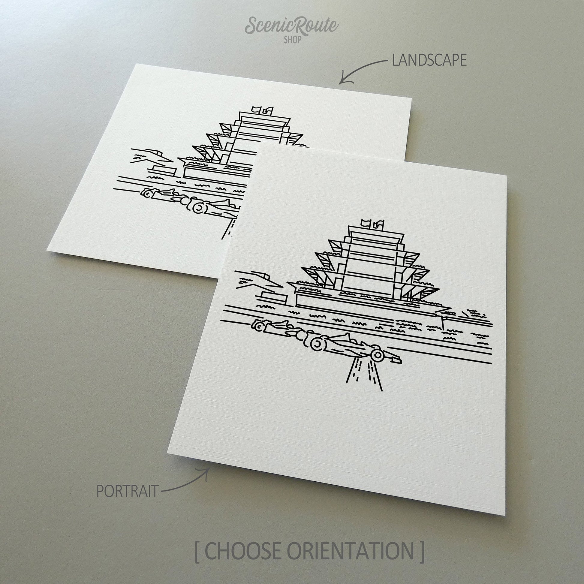 Two line art drawings of the Speedway Pagoda on white linen paper with a gray background.  The pieces are shown in portrait and landscape orientation for the available art print options.