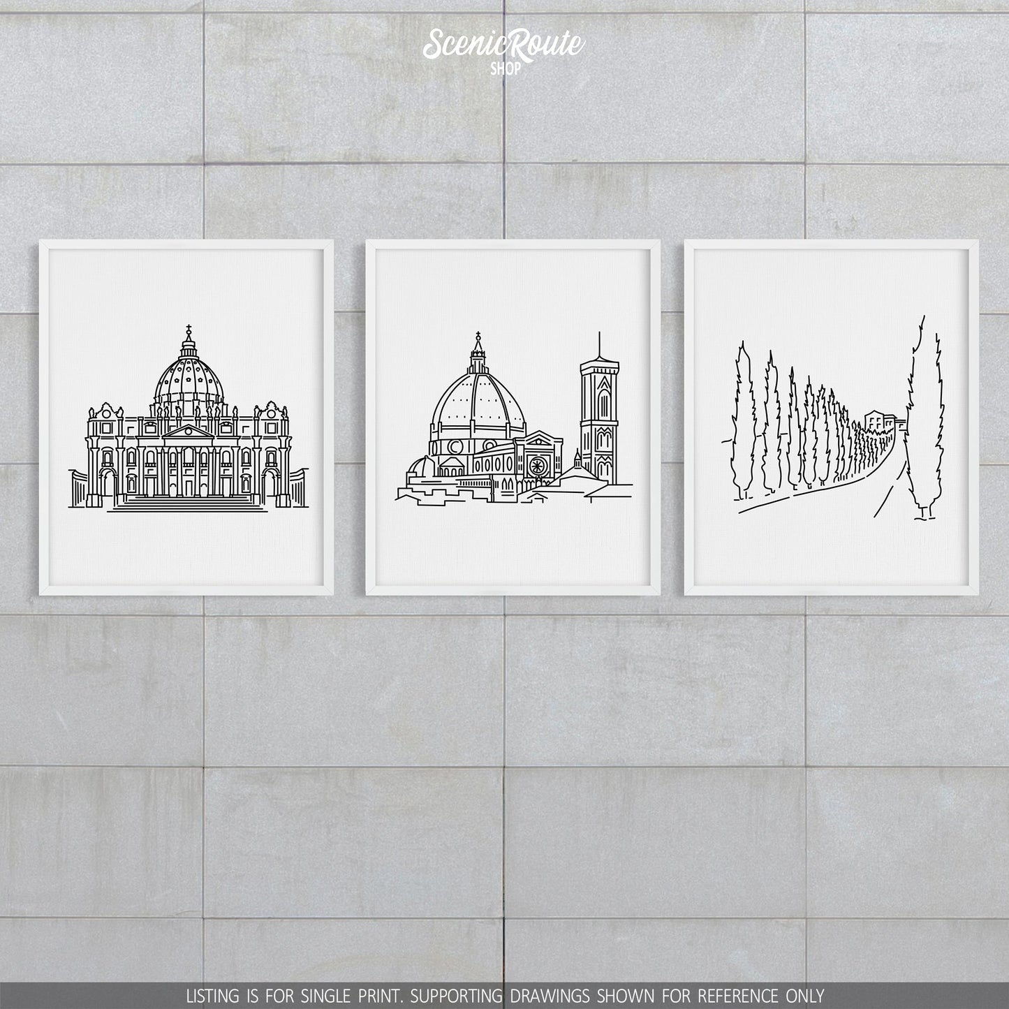 A group of three framed drawings on a block wall. The line art drawings include Saint Peters Basilica, the Florence Duomo, and a Tuscany Drive