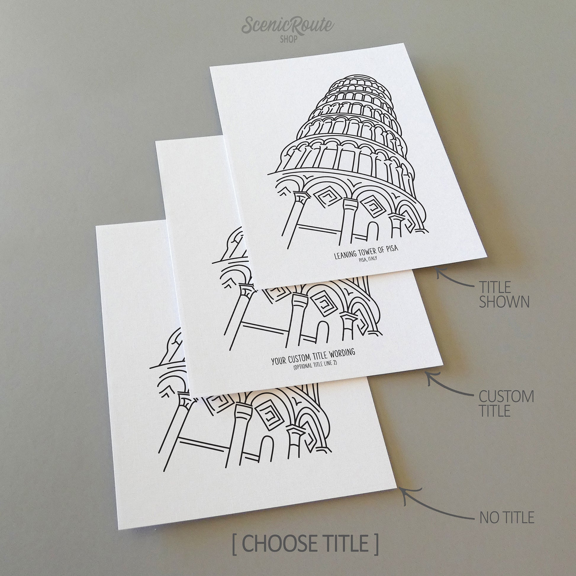 Three line art drawings of the Leaning Tower of Pisa in Italy on white linen paper with a gray background.  The pieces are shown with title options that can be chosen and personalized.