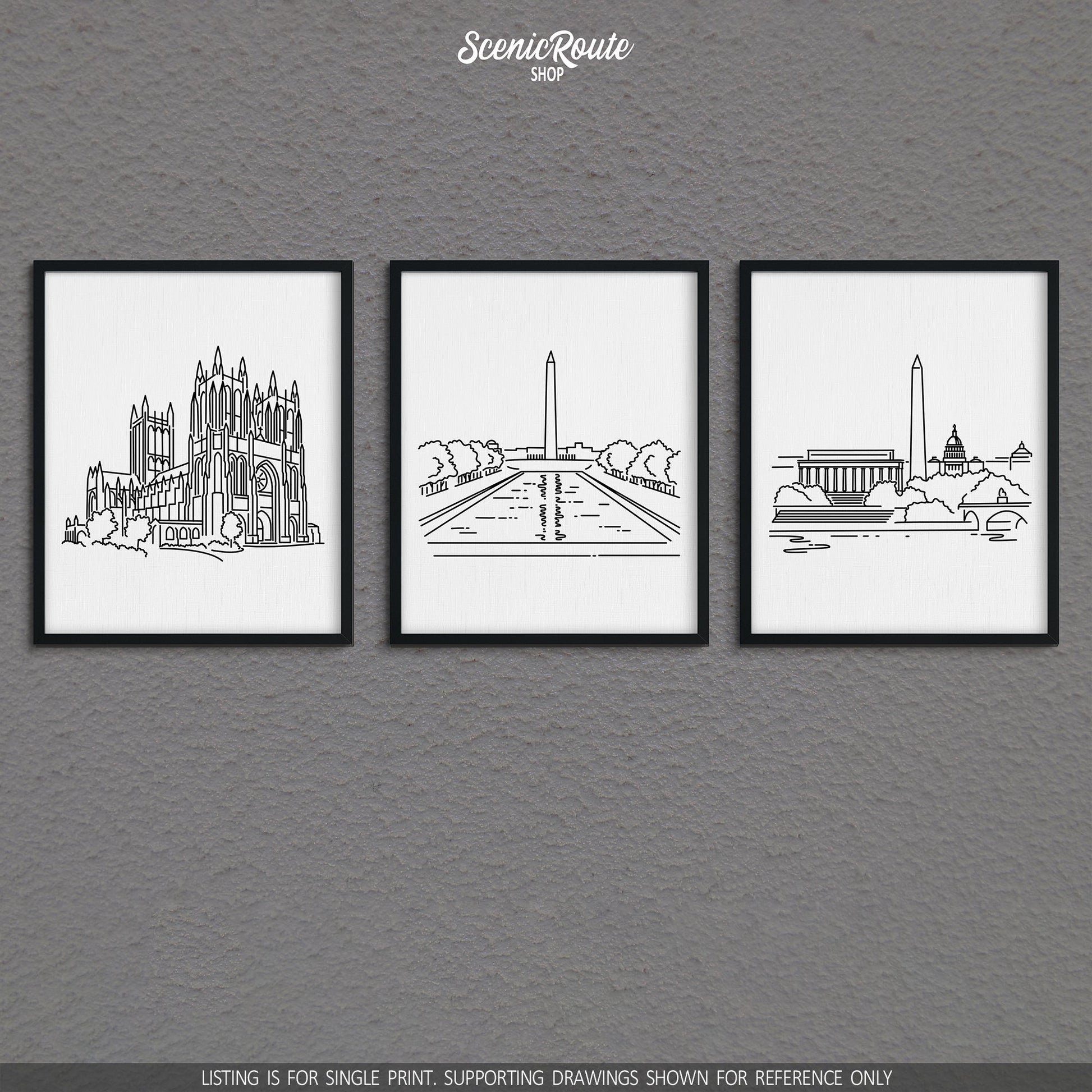 A group of three framed drawings on a gray wall. The line art drawings include the National Cathedral, National Mall, and Washington DC Skyline