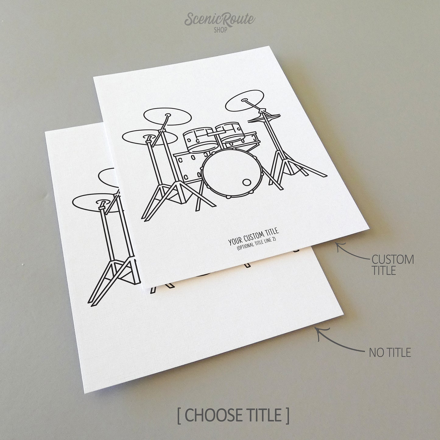 Two line art drawings of a drum set instrument on white linen paper with a gray background.  The pieces are shown with “No Title” and “Custom Title” options for the available art print options.