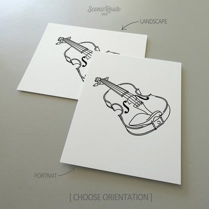 Two line art drawings of a Violin on white linen paper with a gray background.  The pieces are shown in portrait and landscape orientation for the available art print options.