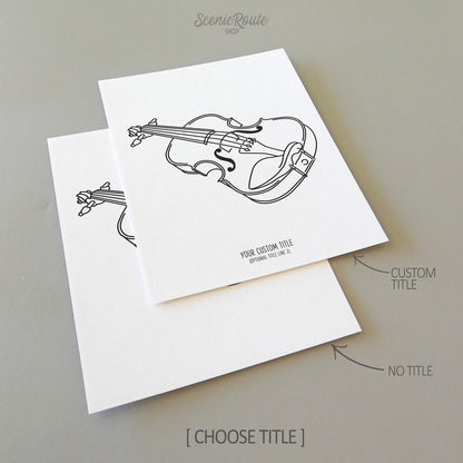 Two line art drawings of a Violin Instrument on white linen paper with a gray background.  The pieces are shown with “No Title” and “Custom Title” options for the available art print options.