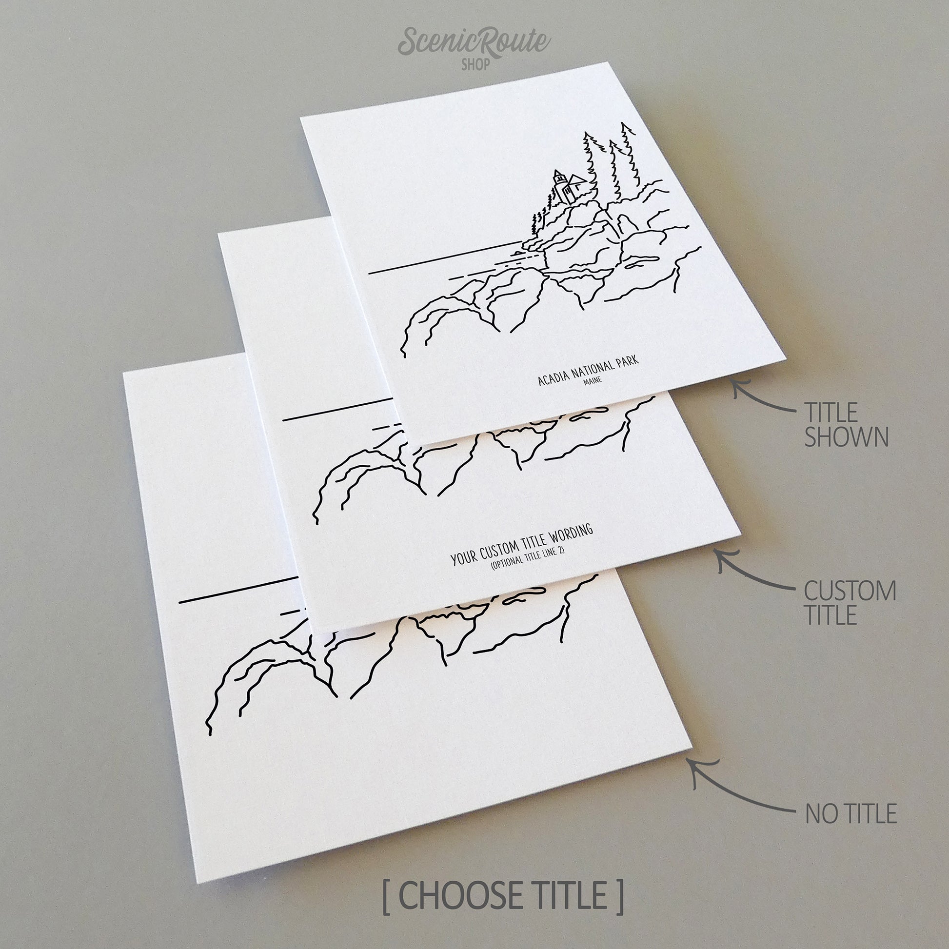 Three line art drawings of Acadia National Park on white linen paper with a gray background. The pieces are shown with title options that can be chosen and personalized.