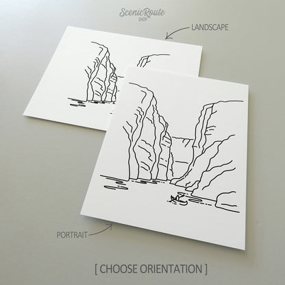 Two line art drawings of Big Bend National Park on white linen paper with a gray background.  The pieces are shown in portrait and landscape orientation for the available art print options.