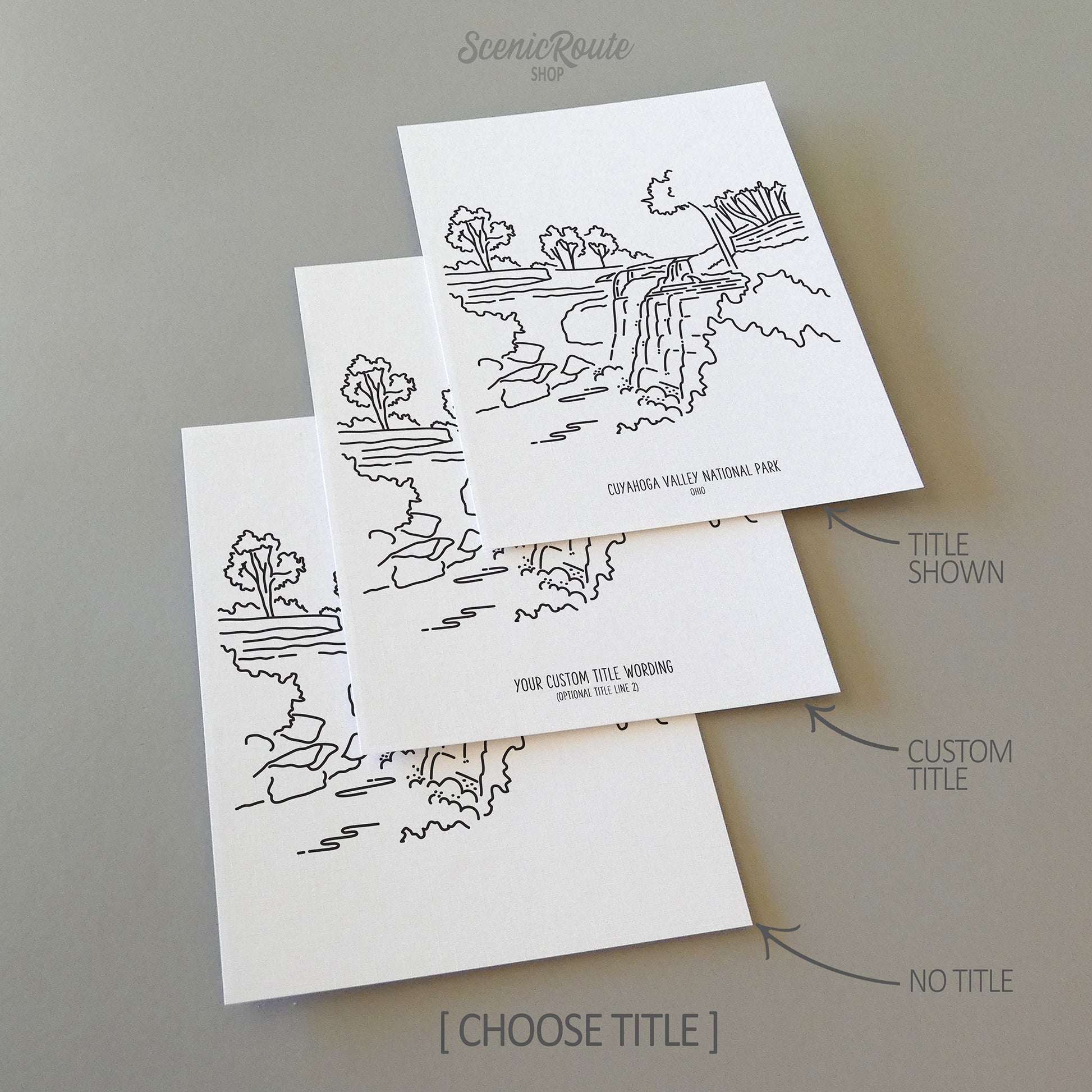 Three line art drawings of Cuyahoga Valley National Park on white linen paper with a gray background. The pieces are shown with title options that can be chosen and personalized.