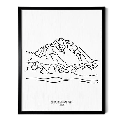 A line art drawing of Denali National Park on white linen paper in a thin black picture frame