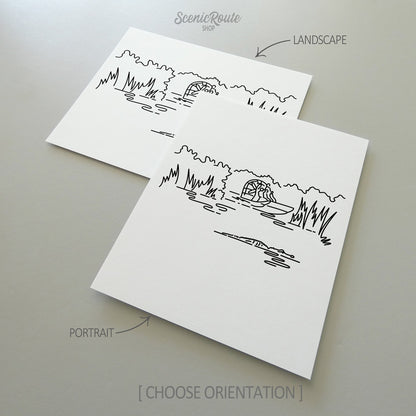 Two line art drawings of Everglades National Park on white linen paper with a gray background.  The pieces are shown in portrait and landscape orientation for the available art print options.