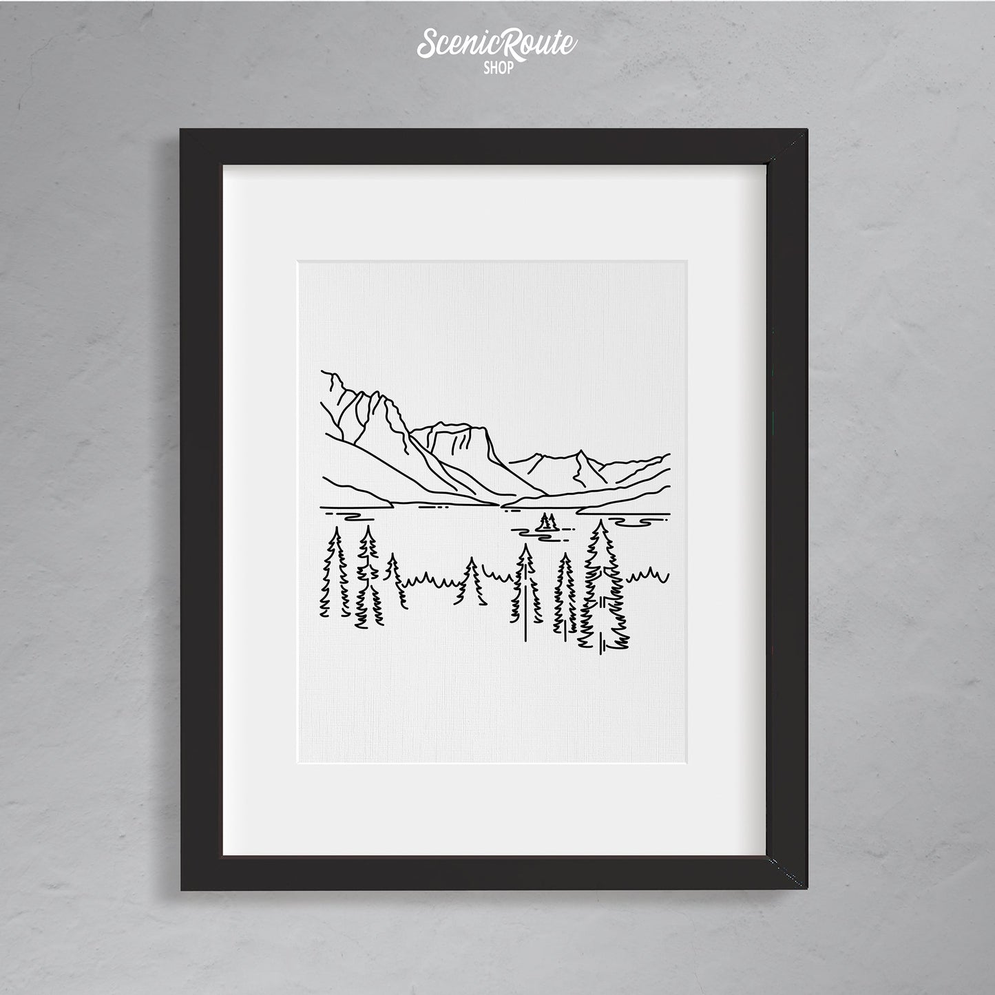 A framed line art drawing of Glacier National Park