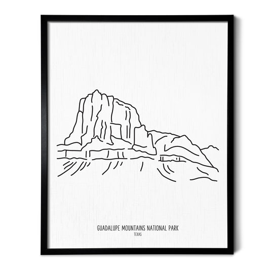 A line art drawing of Guadalupe Mountains National Park on white linen paper in a thin black picture frame