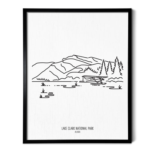 A line art drawing of Lake Clark National Park on white linen paper in a thin black picture frame