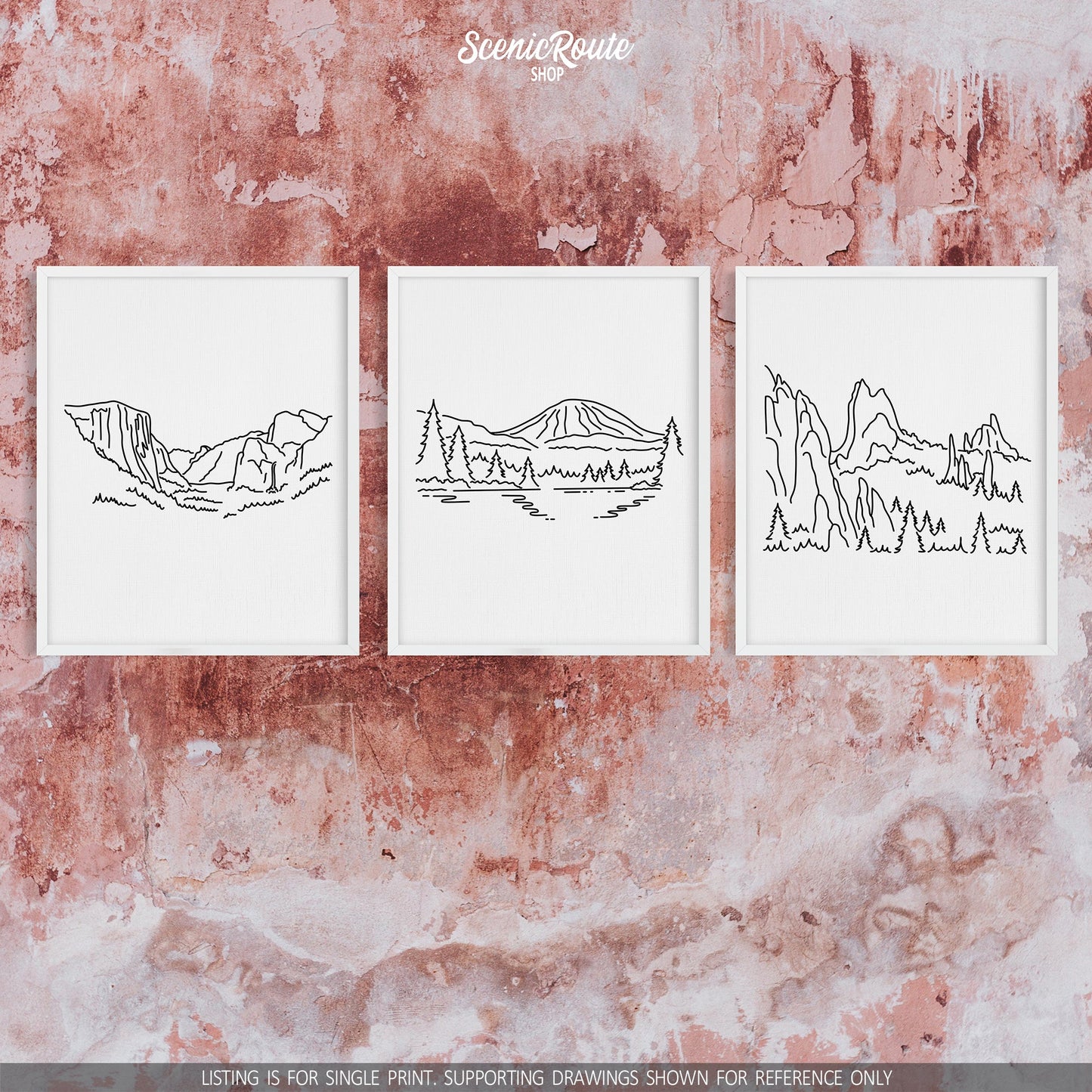 A group of three framed drawings on a concrete wall. The line art drawings include Yosemite National Park, Lassen Volcanic National Park, and the Garden of the Gods