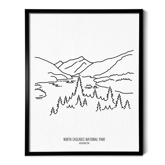 A line art drawing of North Cascades National Park on white linen paper in a thin black picture frame