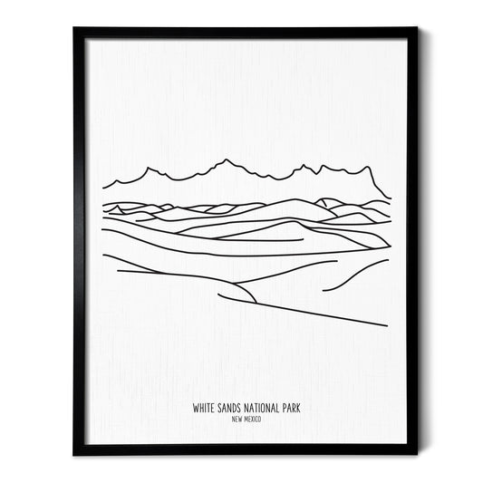 A line art drawing of White Sands National Park on white linen paper in a thin black picture frame