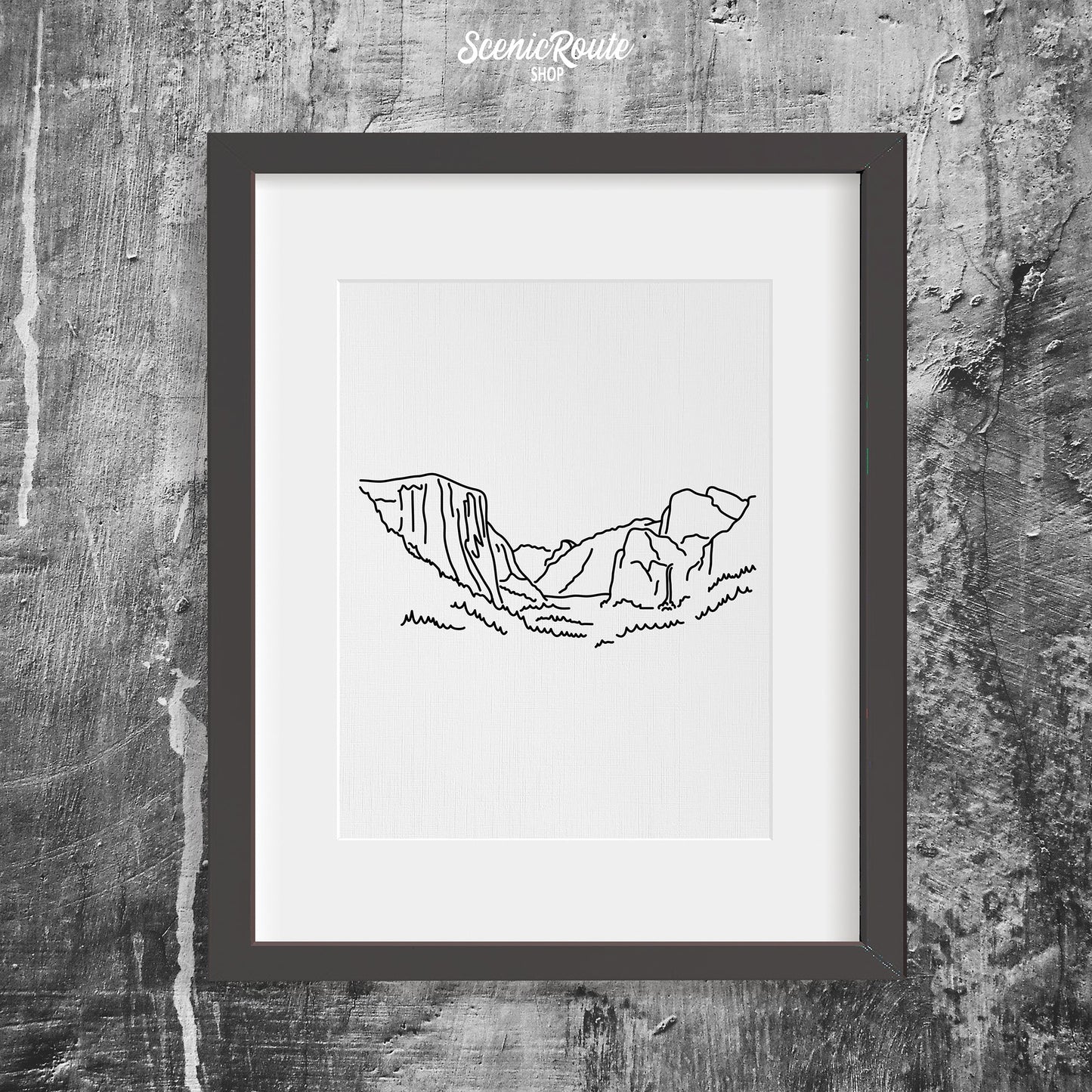 A framed line art drawing of Yosemite National Park