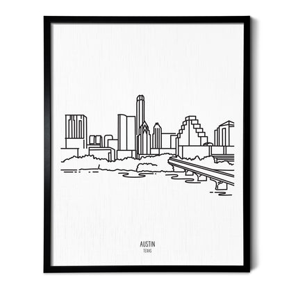 A line art drawing of the Austin Texas Skyline on white linen paper in a thin black picture frame