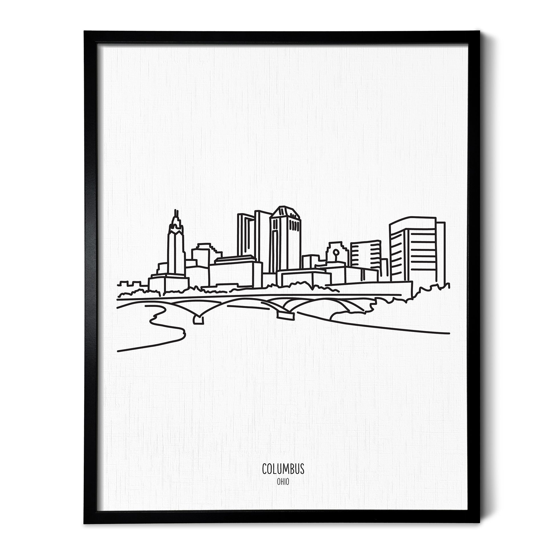 A line art drawing of the Columbus Ohio Skyline on white linen paper in a thin black picture frame