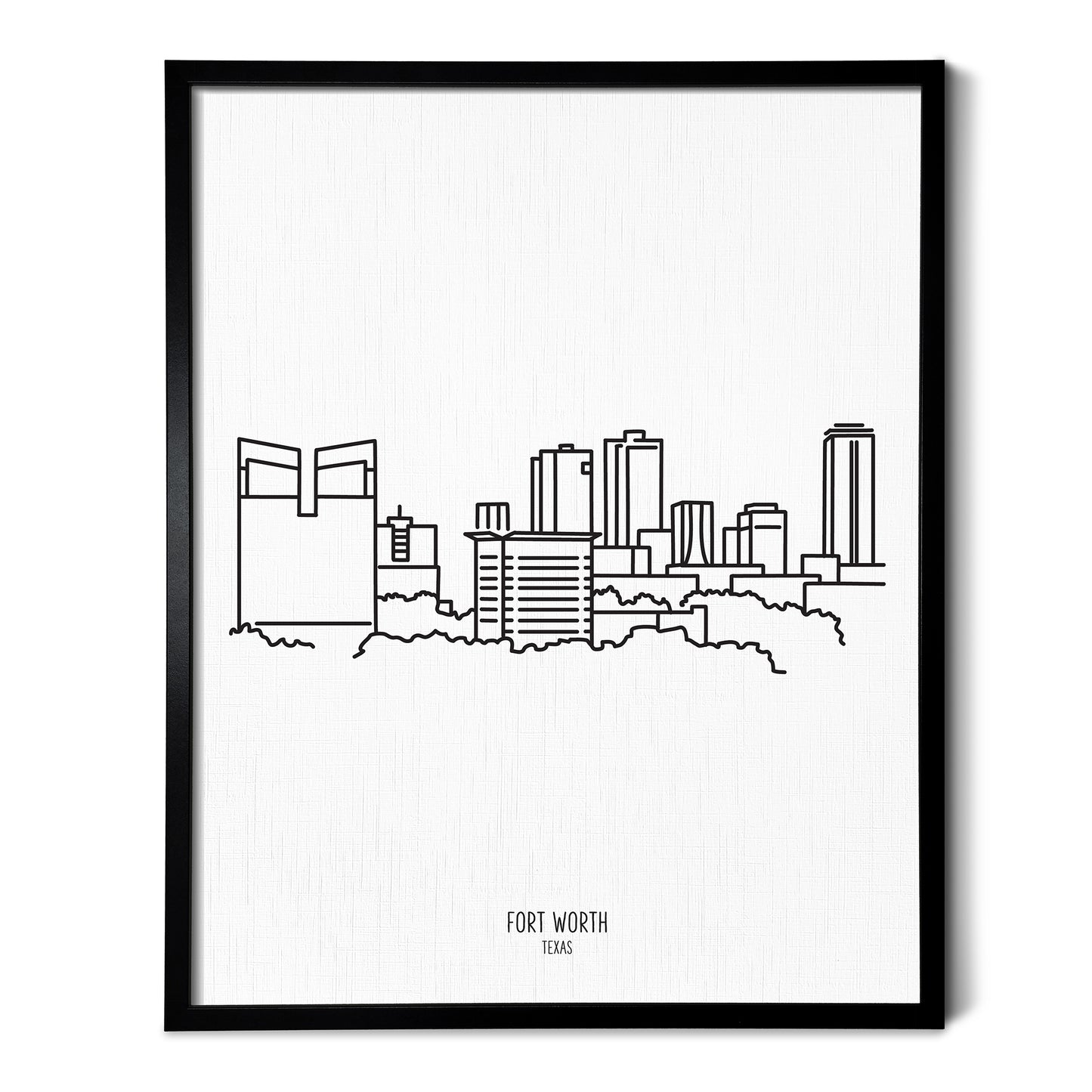 A line art drawing of the Fort Worth Texas Skyline on white linen paper in a thin black picture frame