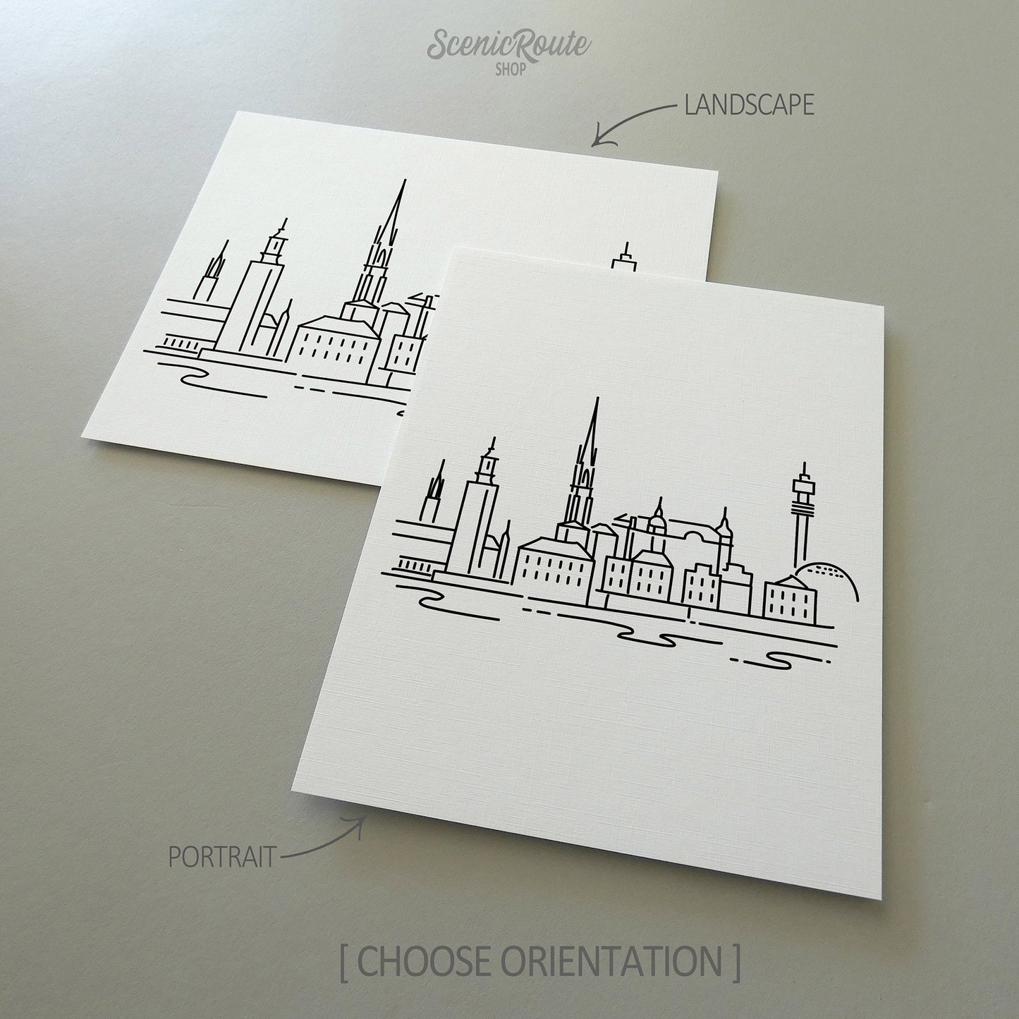 Two line art drawings of the Stockholm Skyline on white linen paper with a gray background. The pieces are shown in portrait and landscape orientation for the available art print options.