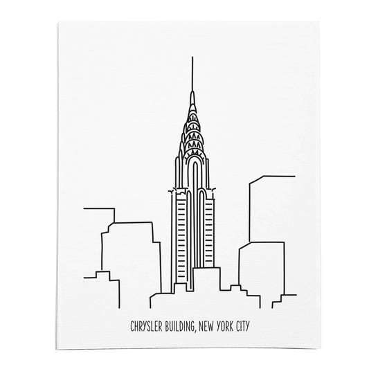 An art print featuring a line drawing of the Chrysler Building on white linen paper