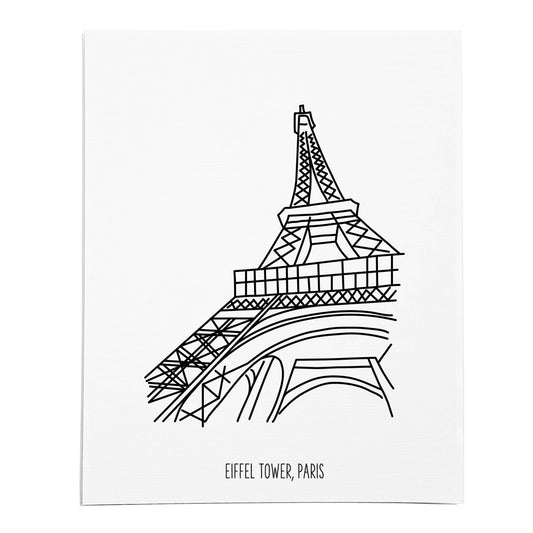 An art print featuring a line drawing of the Eiffel Tower on white linen paper