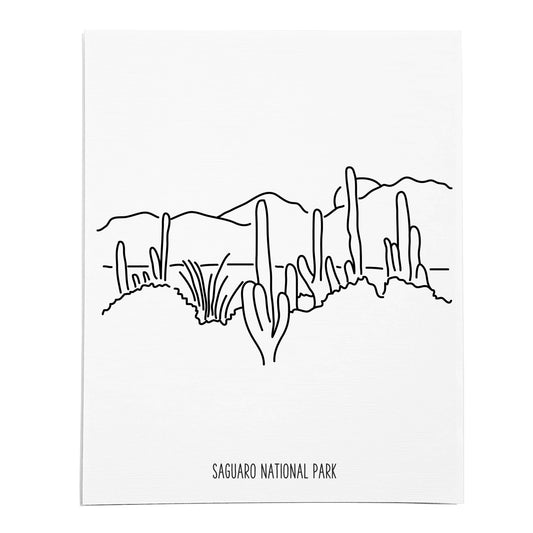 An art print featuring a line drawing of Saguaro National Park on white linen paper