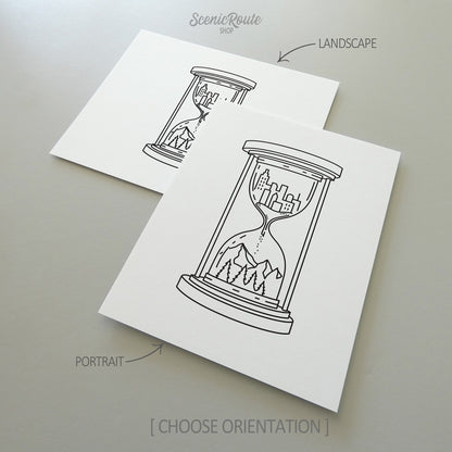 Two line art drawings of the Adventure Hourglass Drawing on white linen paper with a gray background.  The pieces are shown in portrait and landscape orientation for the available art print options.