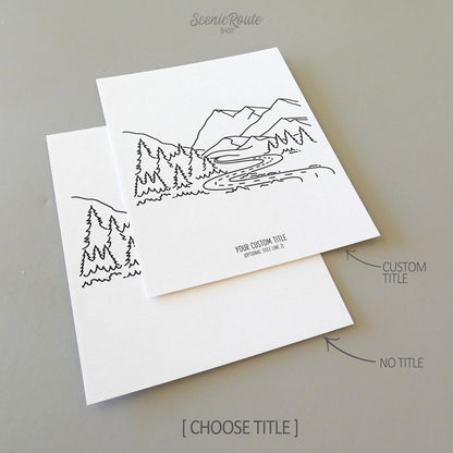 Two line art drawings of the Adventure Mountain Drawing on white linen paper with a gray background.  The pieces are shown with “No Title” and “Custom Title” options for the available art print options.