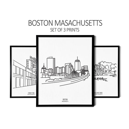 Custom line art drawings of Fenway Park, the Boston Skyline, and the Harvard Boathouse on white linen paper in thin black picture frames