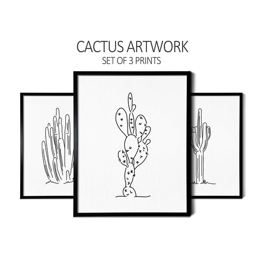 Custom line art drawings of an Organ Pipe Cactus, a Prickly Pear Cactus, and a Saguaro Cactus on white linen paper in thin black picture frames