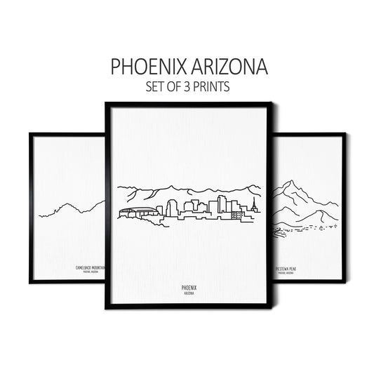 Custom line art drawings of Camelback Mountain, the Phoenix Skyline, and Piestewa Peak on white linen paper in thin black picture frames